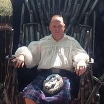 Dr. Rob dressed in Scottish attire