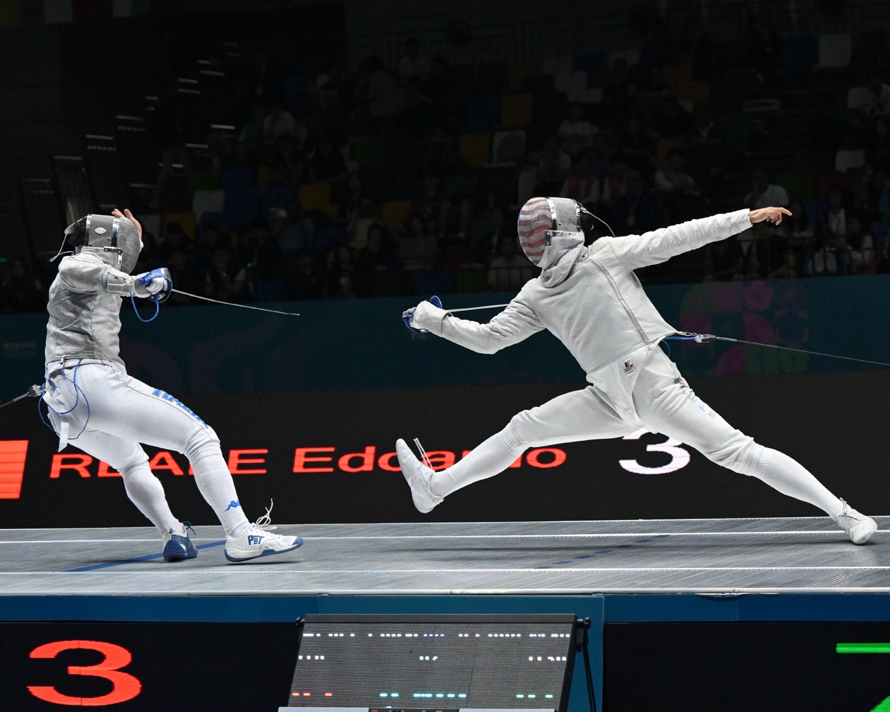 Sport fencing action with foil or epee athletes